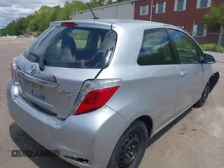 2014 Toyota Yaris L with VIN JTDJTUD38ED587118, listed as a IAAI auction lot 42211424 with 94,616 mi miles and . Bid and sale history available at DreamBid. Image 4.