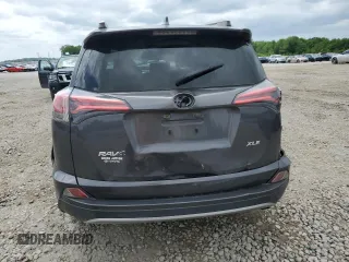 2018 Toyota RAV4 XLE with VIN JTMWFREV3JJ168194, listed as a Copart auction lot 56937675 with 82,589 mi miles and Salvage title. Bid and sale history available at DreamBid. Image 6.