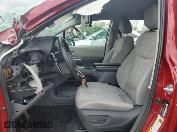 2022 Toyota Sienna LE with VIN 5TDKSKFC9NS056913, listed as a Copart auction lot 55704795 with 71,464 mi miles and Salvage title. Bid and sale history available at DreamBid. Image 7.