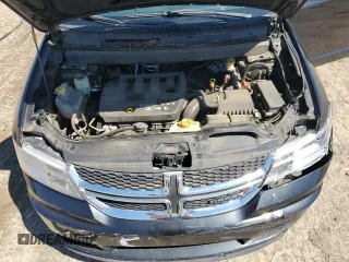 2013 Dodge Journey SE with VIN 3C4PDCAB5DT729415, listed as a Copart auction lot 55851915 with 128,782 mi miles and Salvage title. Bid and sale history available at DreamBid. Image 12.