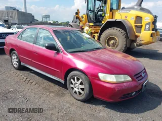 2002 Honda Accord SE z VIN 1HGCG66802A008221, wystawiony jako IAAI lot #42219817 z przebiegiem 153 676 mil mil oraz . Historia ofert i sprzedaży dostępna na DreamBid. Obrazek 1.