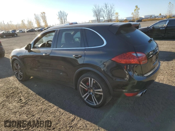 2012 Porsche Cayenne Turbo with VIN WP1AC2A26CLA82602, listed as a Copart auction lot 77752814 with 115,965 mi miles and Salvage title. Bid and sale history available at DreamBid. Image 2.