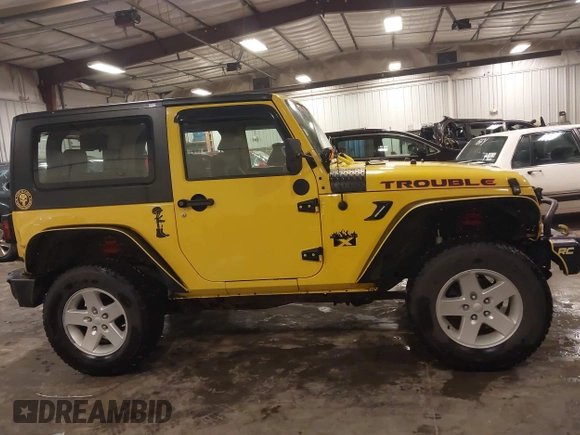 2008 Jeep Wrangler X with VIN 1J8FA24108L597093, listed as a IAAI auction lot 42401363 with 215,424 mi miles and . Bid and sale history available at DreamBid. Image 14.