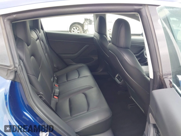 2020 Tesla Model 3 Standard Range Plus z VIN 5YJ3E1EA7LF705809, wystawiony jako IAAI lot #42146416 z przebiegiem 52 056 mil mil oraz . Historia ofert i sprzedaży dostępna na DreamBid. Obrazek 8.