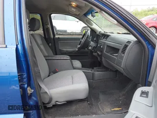 2010 Dodge Dakota Bighorn/Lonestar z VIN 1D7CW3GPXAS116883, wystawiony jako IAAI lot #42329654 z przebiegiem 90 057 mil mil oraz . Historia ofert i sprzedaży dostępna na DreamBid. Obrazek 5.
