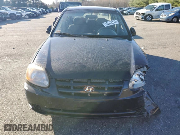 2005 Hyundai Accent GLS z VIN KMHCG45C15U662362, wystawiony jako Copart lot #80574774 z przebiegiem 122 898 mil mil oraz Szkoda całkowita • Salvage title. Historia ofert i sprzedaży dostępna na DreamBid. Obrazek 5.