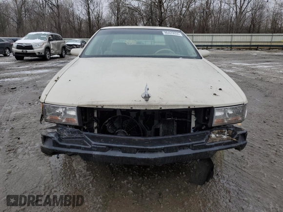 1995 Cadillac DeVille z VIN 1G6KD52B8SU274053, wystawiony jako Copart lot #86429934 z przebiegiem 100 496 mil mil oraz Szkoda całkowita • Salvage title. Historia ofert i sprzedaży dostępna na DreamBid. Obrazek 5.