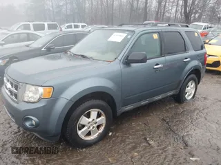 2011 Ford Escape XLT with VIN 1FMCU0D70BKA25265, listed as a IAAI auction lot 41539864 with 1 mi miles. Bid and sale history available at carsss.com. Image 2.
