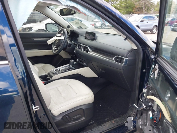 2019 Mazda CX-5 Grand Touring with VIN JM3KFBDM2K0603400, listed as a IAAI auction lot 42051135 with 59,448 mi miles and . Bid and sale history available at DreamBid. Image 5.
