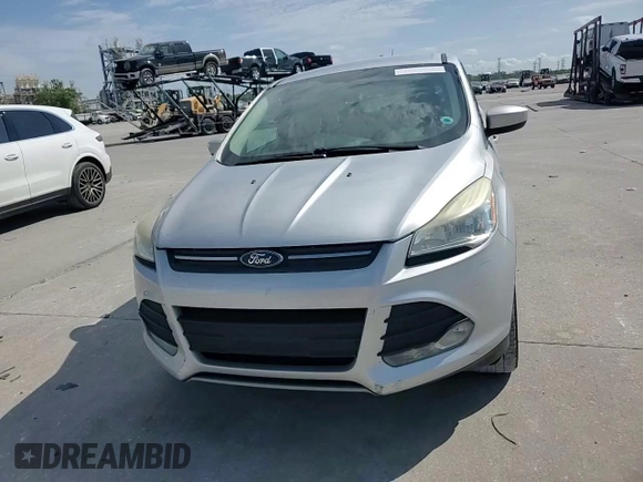 2013 Ford Escape SE с VIN 1FMCU0G9XDUA41798, выставлен на аукционе Copart как лот 57460025 с пробегом 137 816 миль миль и Списание • Salvage title. История ставок и продаж доступна на DreamBid. Изображение 14.