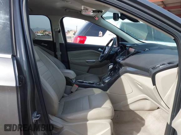 2014 Ford Escape Titanium with VIN 1FMCU0JX5EUC00297, listed as a IAAI auction lot 41928316 with 146,406 mi miles. Bid and sale history available at carsss.com. Image 5.