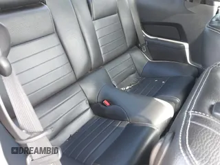 2012 Ford Mustang Premium with VIN 1ZVBP8AM8C5276970, listed as a IAAI auction lot 41195671 with 88,420 mi miles and . Bid and sale history available at DreamBid. Image 8.