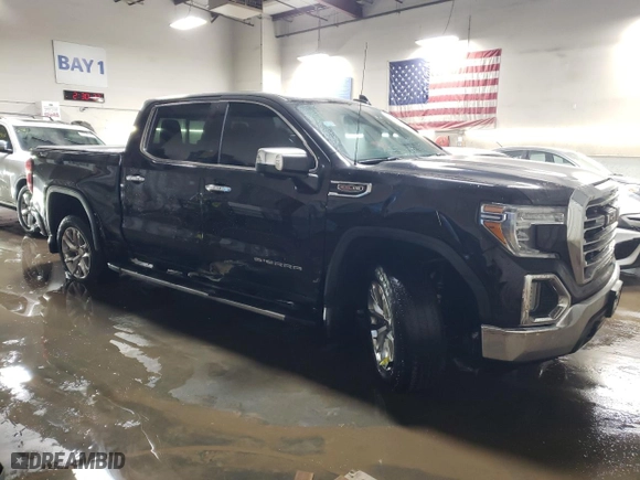2019 GMC Sierra 1500 SLT with VIN 3GTU9DEL6KG281589, listed as a Copart auction lot 87168524 with 69,415 mi miles and Salvage Title. Bid and sale history available at carsss.com. Image 4.