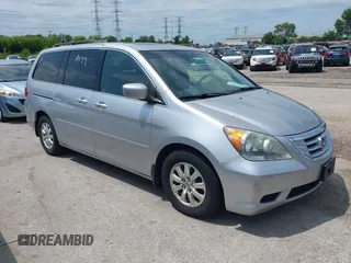2010 Honda Odyssey EX-L z VIN 5FNRL3H75AB017378, wystawiony jako IAAI lot #42698499 z przebiegiem 150 555 mil mil oraz . Historia ofert i sprzedaży dostępna na DreamBid. Obrazek 1.