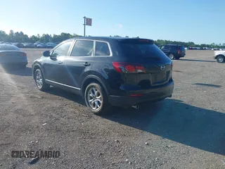 2014 Mazda CX-9 Touring with VIN JM3TB2CA1E0434126, listed as a IAAI auction lot 42639539 with 116,247 mi miles and . Bid and sale history available at DreamBid. Image 3.
