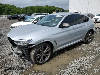 2019 BMW X4 M40i with VIN 5UXUJ5C51KLJ64098, listed as a Copart auction lot 66424934 with 6,213 mi miles and Salvage Title. Bid and sale history available at carsss.com. Image 1.