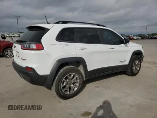 2022 Jeep Cherokee Trailhawk with VIN 1C4PJMBXXND502267, listed as a Copart auction lot 48522564 with 28,554 mi miles and Clean Title. Bid and sale history available at carsss.com. Image 3.
