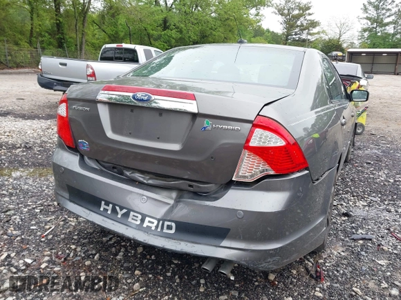 2011 Ford Fusion Hybrid z VIN 3FADP0L32BR238153, wystawiony jako IAAI lot #42113064 z przebiegiem 145 932 mil mil oraz . Historia ofert i sprzedaży dostępna na DreamBid. Obrazek 6.