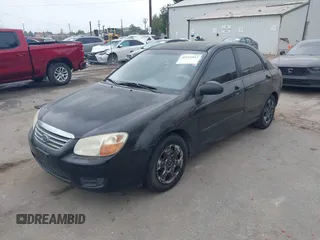 2008 Kia Spectra EX with VIN KNAFE122985511931, listed as a IAAI auction lot 42111053 with 251,276 mi miles. Bid and sale history available at carsss.com. Image 2.