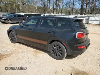 2016 MINI Clubman z VIN WMWLN5C50G2E29737, wystawiony jako Copart lot #50459135 z przebiegiem 129 940 mil mil oraz Szkody całkowita. Historia ofert i sprzedaży dostępna na DreamBid. Obrazek 2.