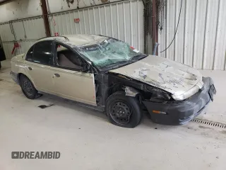 1997 Saturn SL with VIN 1G8ZH5288VZ126846, listed as a Copart auction lot 47024465 with 152,336 mi miles and Salvage Title. Bid and sale history available at carsss.com. Image 4.