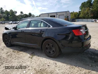 2014 Ford Police Interceptor with VIN 1FAHP2MTXEG124103, listed as a Copart auction lot 72791314 with 136,143 mi miles and Clean title. Bid and sale history available at DreamBid. Image 2.