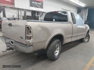 1998 Ford F-150 Standard with VIN 1FTZX18W6WKA83626, listed as a IAAI auction lot 40625179 with 343,403 mi miles. Bid and sale history available at carsss.com. Image 4.