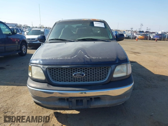 1999 Ford F-150 with VIN 2FTRX17L8XCB23329, listed as a IAAI auction lot 41448347 with 223,517 mi miles and . Bid and sale history available at DreamBid. Image 6.