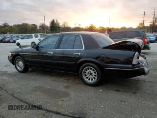 2000 Ford Crown Victoria LX z VIN 2FAFP74W3YX122481, wystawiony jako Copart lot #79189794 z przebiegiem 277 772 mil mil oraz Nie do naprawy • Non repairable. Historia ofert i sprzedaży dostępna na DreamBid. Obrazek 2.