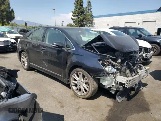 2010 Lexus HS 250h with VIN JTHBB1BA3A2006006, listed as a Copart auction lot 64557664 with 193,900 mi miles and Salvage Title. Bid and sale history available at DreamBid. Image 4.