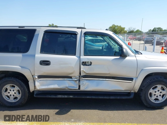 2005 Chevrolet Suburban LT z VIN 3GNEC16Z25G158651, wystawiony jako IAAI lot #42013616 z przebiegiem 221 755 mil mil oraz . Historia ofert i sprzedaży dostępna na DreamBid. Obrazek 6.