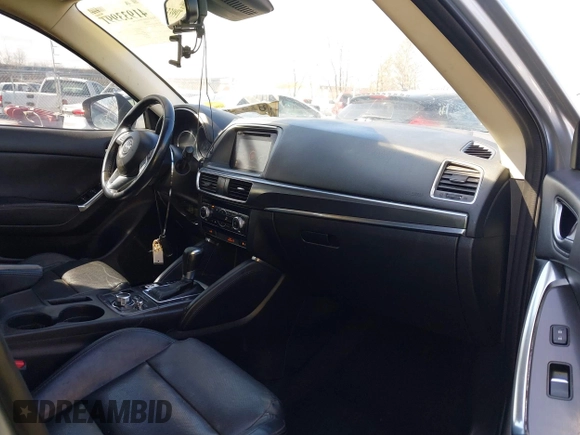 2016 Mazda CX-5 Grand Touring with VIN JM3KE4DY9G0795360, listed as a IAAI auction lot 41933991 with 176,373 mi miles. Bid and sale history available at carsss.com. Image 5.