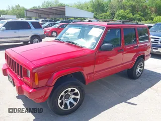 1998 Jeep Cherokee Sport with VIN 1J4FT68S2WL256846, listed as a IAAI auction lot 41998490 with 198,936 mi miles. Bid and sale history available at carsss.com. Image 2.