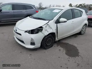 2013 Toyota Prius c One with VIN JTDKDTB30D1535707, listed as a IAAI auction lot 41447362 with 176,881 mi miles. Bid and sale history available at carsss.com. Image 2.