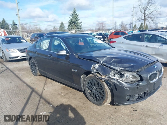 2014 BMW 5 Series 535i xDrive with VIN WBA5B3C52ED534784, listed as a IAAI auction lot 41875567 with 128,533 mi miles and . Bid and sale history available at carsss.com. Image 1.
