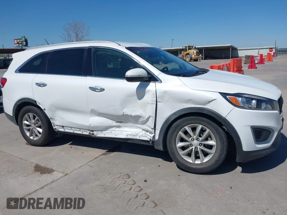 2016 Kia Sorento LX z VIN 5XYPGDA50GG141084, wystawiony jako IAAI lot #41848617 z przebiegiem 102 576 mil mil oraz . Historia ofert i sprzedaży dostępna na DreamBid. Obrazek 6.
