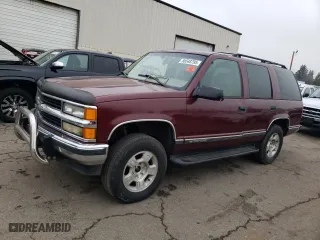 1999 Chevrolet Tahoe Z71 with VIN 1GNEK13R8XJ530020, listed as a Copart auction lot 46325435 with 409,412 mi miles and Salvage Title. Bid and sale history available at carsss.com. Image 1.