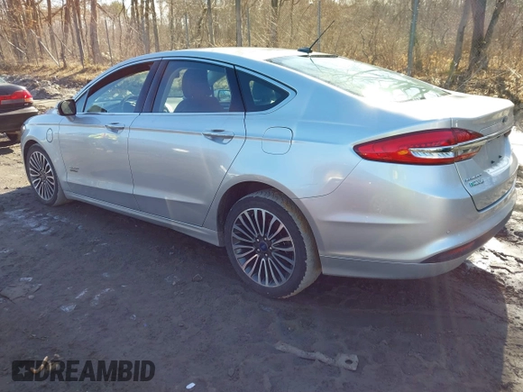 2018 Ford Fusion Energi SE with VIN 3FA6P0PU0JR164192, listed as a IAAI auction lot 41821301 with 114,141 mi miles. Bid and sale history available at carsss.com. Image 3.