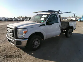 2014 Ford Super Duty F-250 SRW XL with VIN 1FTBF2A6XEEB79132, listed as a IAAI auction lot 39455654 with 180,128 mi miles. Bid and sale history available at carsss.com. Image 2.