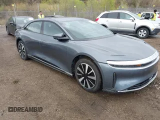 2023 Lucid Air Pure with VIN 50EA1PFA5PA007794, listed as a IAAI auction lot 42113156 with 5,052 mi miles. Bid and sale history available at carsss.com. Image 1.