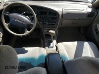 1996 Toyota Camry LE with VIN 4T1BF12K3TU132870, listed as a Copart auction lot 58052975 with 88,210 mi miles and Salvage title. Bid and sale history available at DreamBid. Image 8.