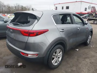 2018 Kia Sportage LX with VIN KNDPMCAC7J7393243, listed as a IAAI auction lot 41484579 with 122,022 mi miles. Bid and sale history available at carsss.com. Image 4.