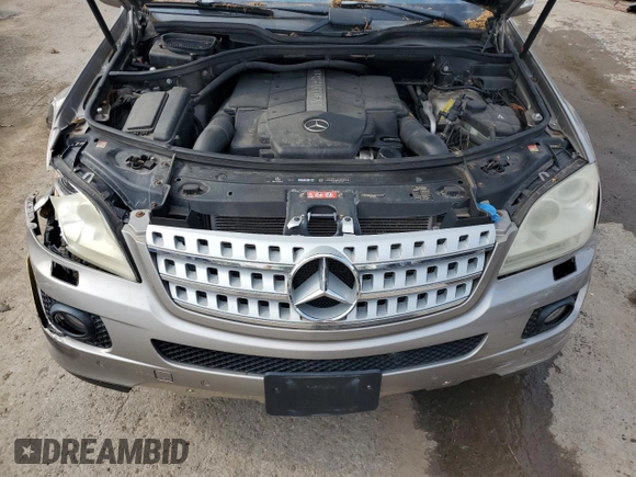 2006 Mercedes-Benz M 500 z VIN 4JGBB75E86A099990, wystawiony jako Copart lot #59701535 z przebiegiem 124 572 mil mil oraz Szkoda całkowita • Salvage title. Historia ofert i sprzedaży dostępna na DreamBid. Obrazek 11.