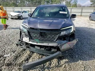2019 Honda Passport EX-L with VIN 5FNYF7H5XKB001901, listed as a Copart auction lot 87186504 with 93,540 mi miles and Salvage Title. Bid and sale history available at carsss.com. Image 14.