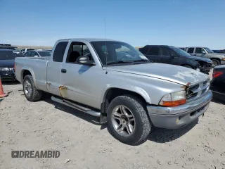 2004 Dodge Dakota SLT with VIN 1D7GL42N84S693356, listed as a Copart auction lot 53311415 with 224,342 mi miles and Salvage title. Bid and sale history available at DreamBid. Image 4.