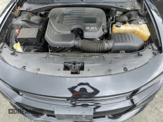 2015 Dodge Charger SXT с VIN 2C3CDXHG8FH852570, выставлен на аукционе Copart как лот 57896135 с пробегом 204 040 миль миль и Списание • Salvage title. История ставок и продаж доступна на DreamBid. Изображение 11.