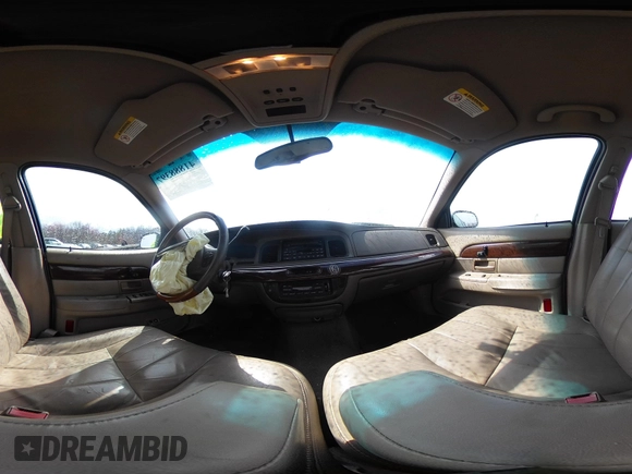 2003 Mercury Grand Marquis LS Premium with VIN 2MEFM75WX3X634344, listed as a IAAI auction lot 41888397 with 129,651 mi miles and . Bid and sale history available at DreamBid. Image 19.