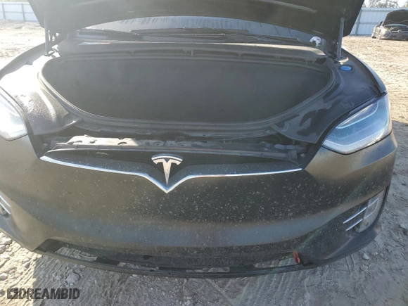 2017 Tesla Model X P100D with VIN 5YJXCBE4XHF040743, listed as a Copart auction lot 74010904 with NaN miles and Salvage Title. Bid and sale history available at carsss.com. Image 12.