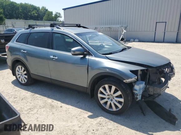 2010 Mazda CX-9 Grand Touring with VIN JM3TB2MA2A0221193, listed as a Copart auction lot 62202795 with 252,040 mi miles and Salvage title. Bid and sale history available at DreamBid. Image 4.