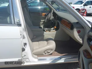 2003 Jaguar XJ 8 with VIN SAJDA14C03LF52338, listed as a IAAI auction lot 42684038 with 142,107 mi miles and . Bid and sale history available at DreamBid. Image 5.